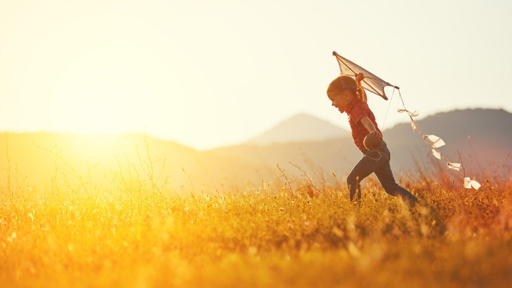 Kid Playing with Kite
